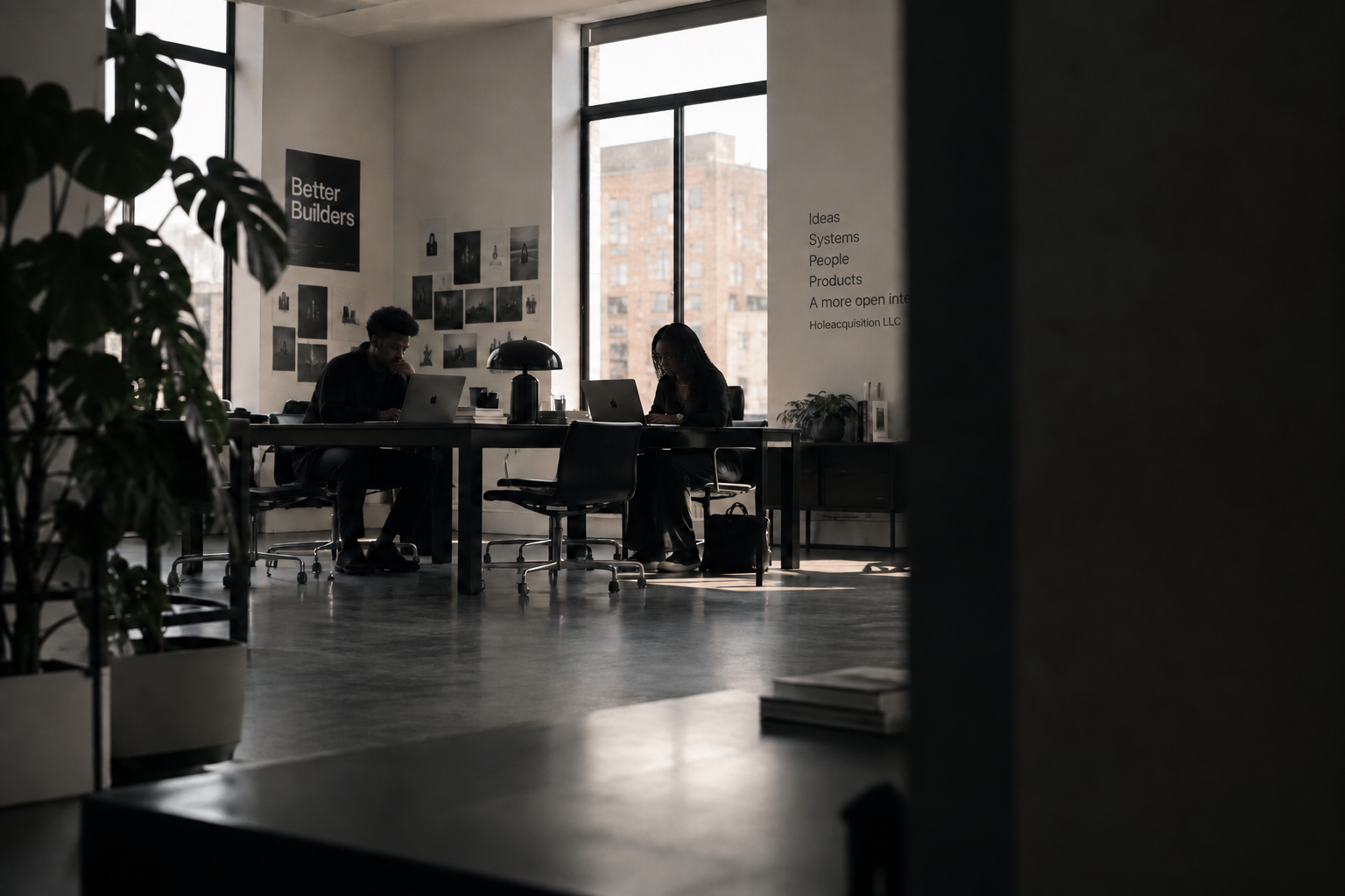 Holeacquisition LLC developers building together in the studio